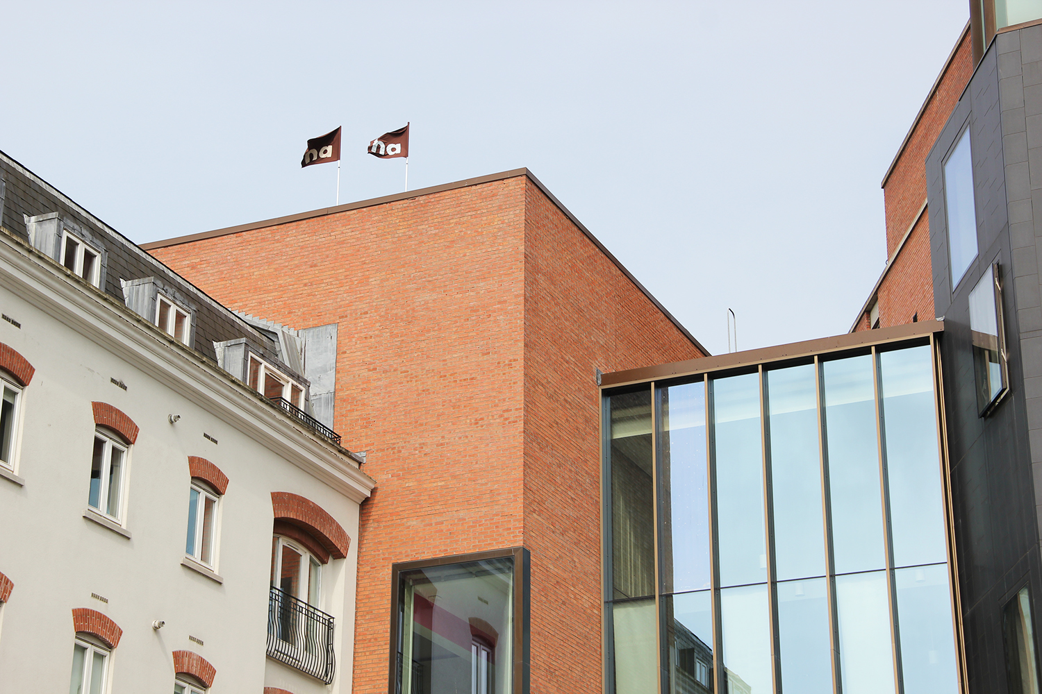 Image of two 'ha ha' flags on the MAC Art Centre building - clearly displaying 'ha ha'.